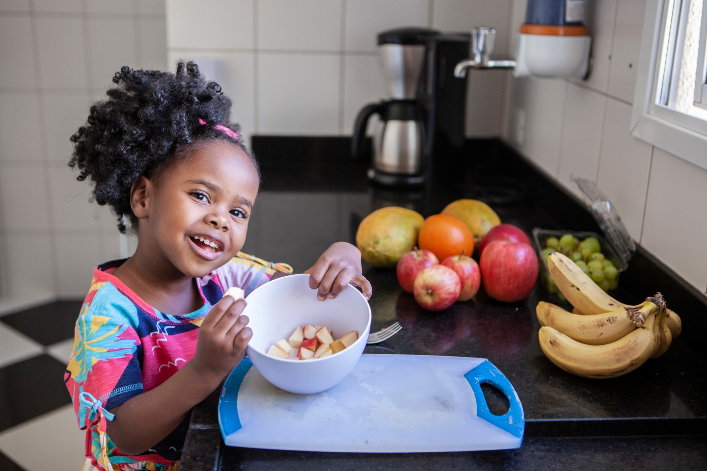 young girl eating healthy foods